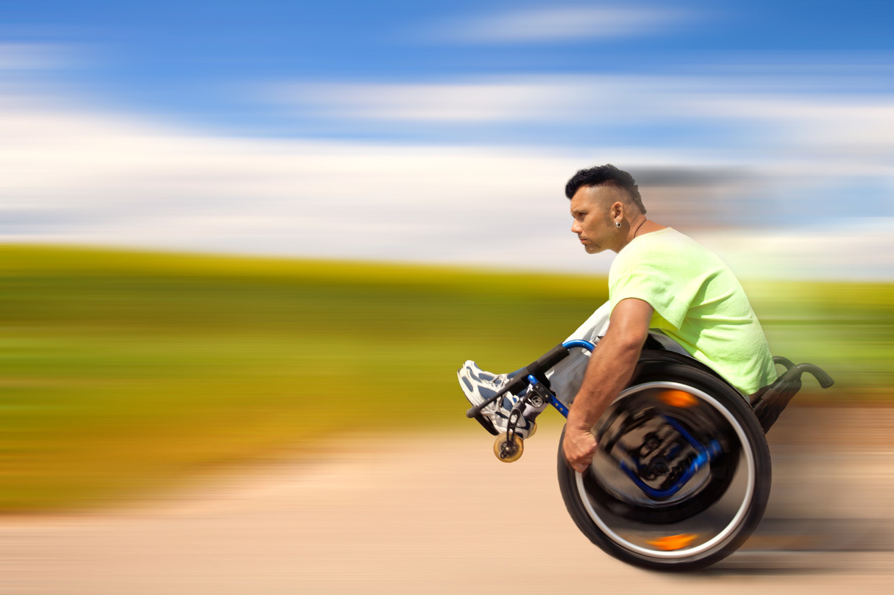 Person on their wheelchair going at speed