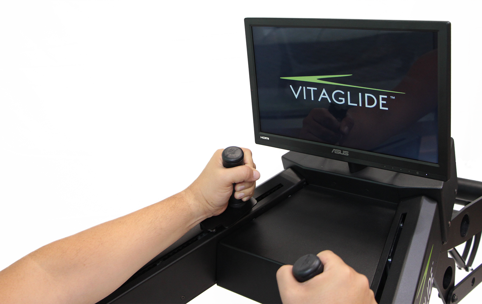 Image of VitaGlide user looking at monitor on the machine