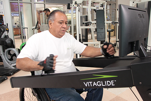 Image of VitaGlide user using the machine at the gym